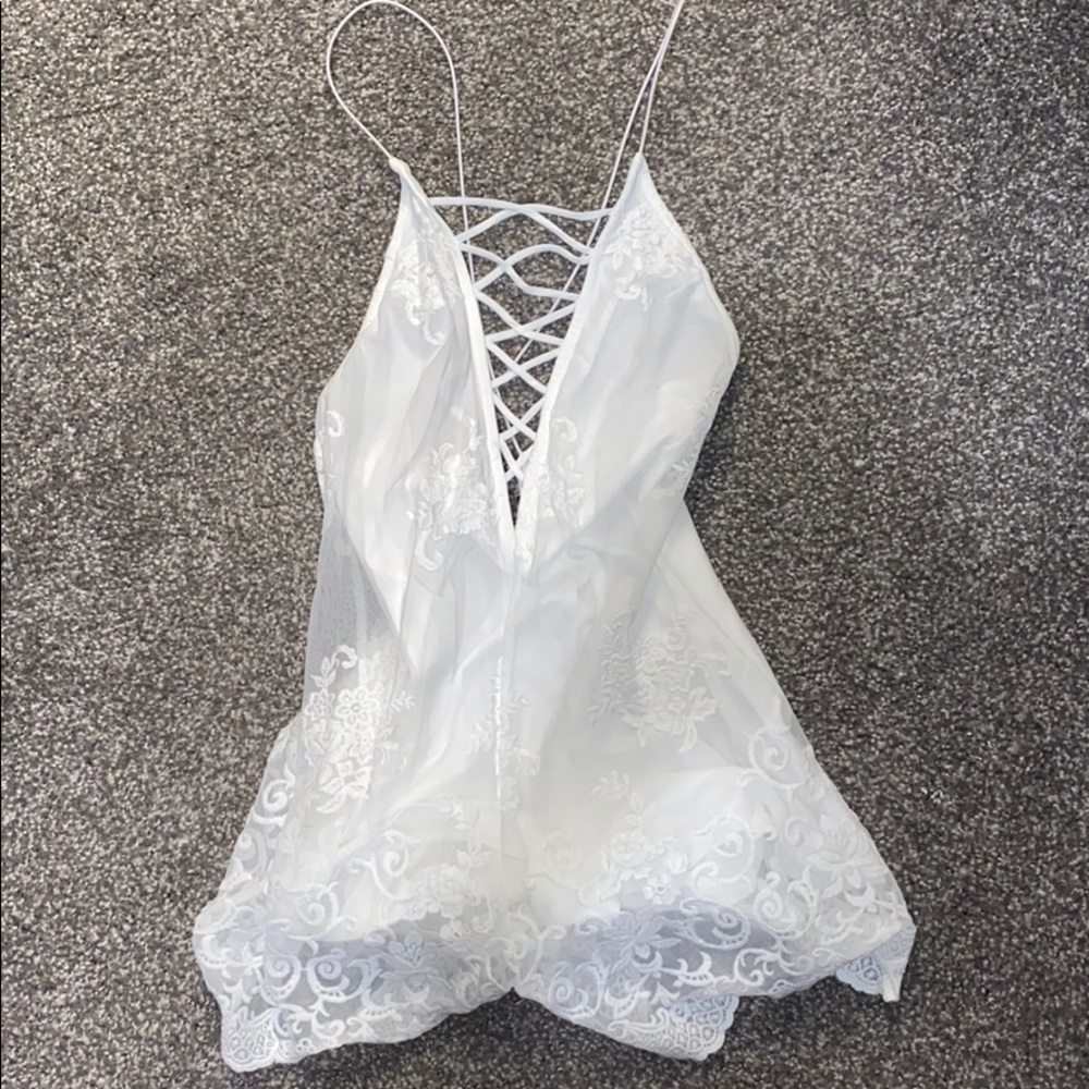 White lace romper with open back